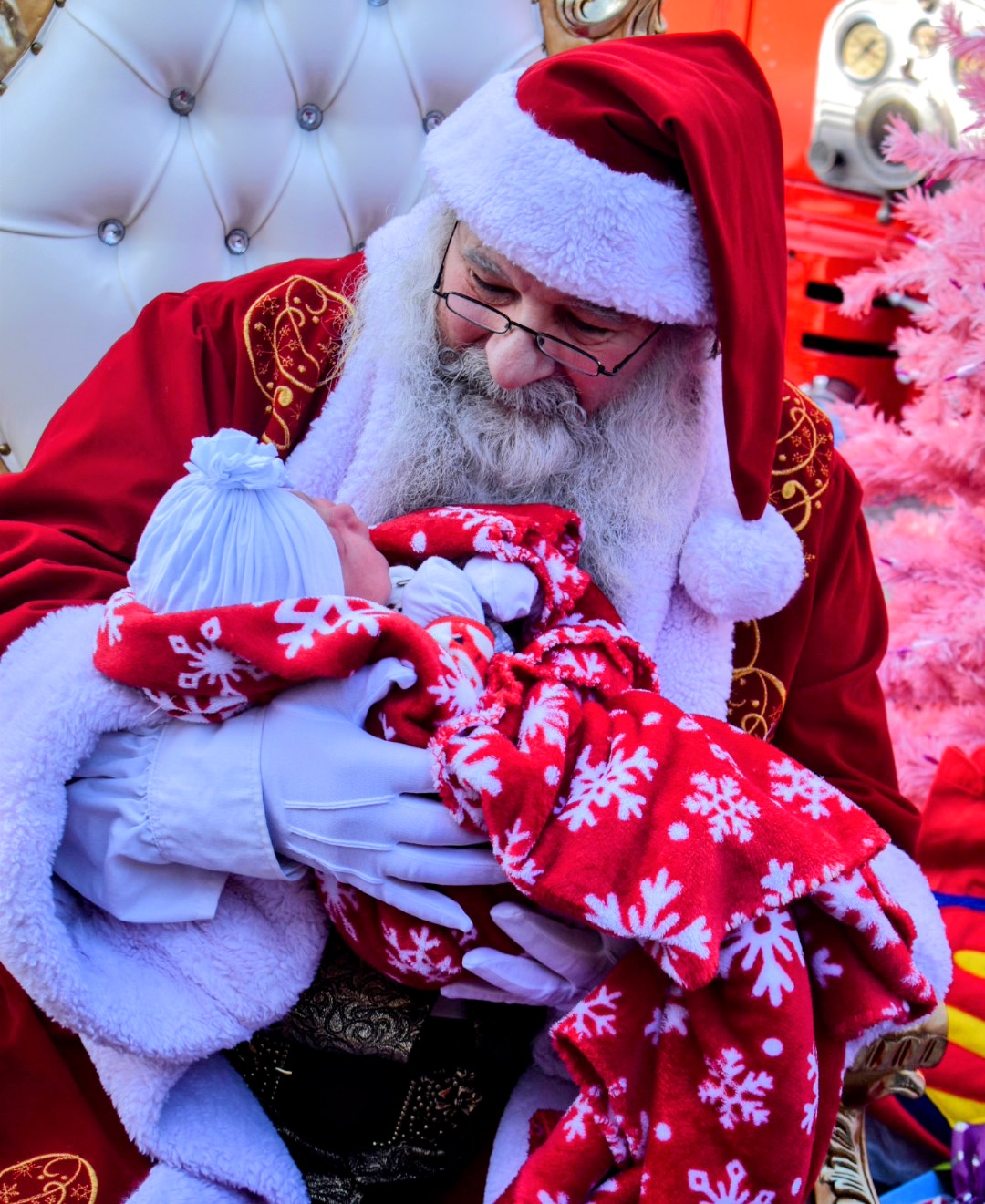 Santa holding baby